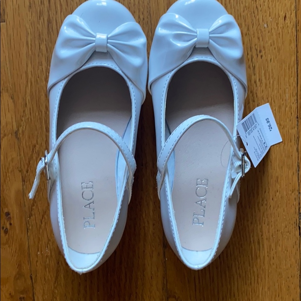 White patent Mary Jane style girls’ dress shoes